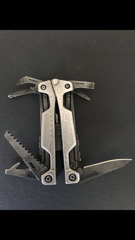 LEATHERMAN OHT!! (SILVER WITH BLACK MOLLE SHEATH!!!) Great Condition!!