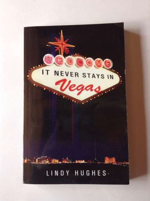 It Never Stays in Vegas by Lindy Hughes