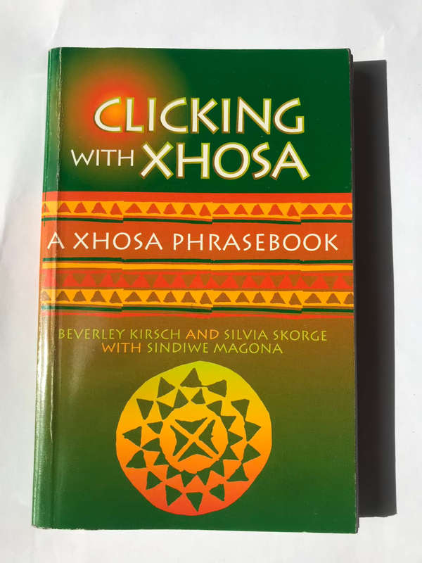 CLICKING WITH XHOSA: A Xhosa Phrasebook by Beverley Kirsch, Sylvia Skorge and Sindiwe Magona