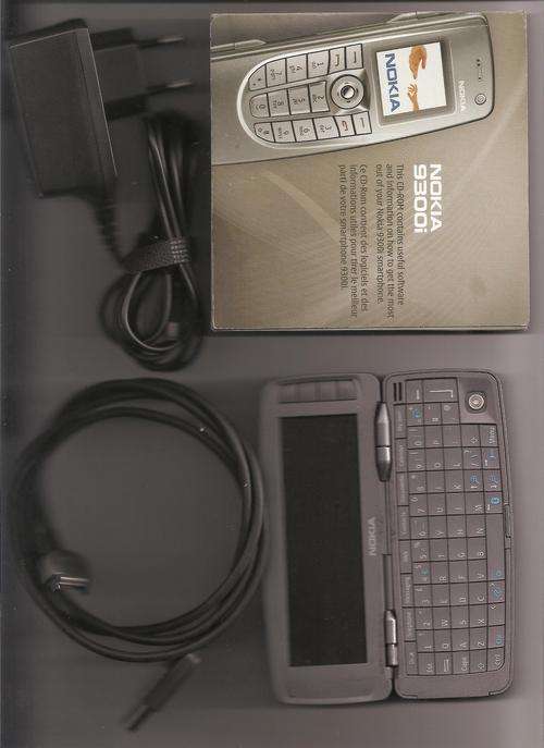 NOKIA 9300I WITH CHARGER, CD AND COMPUTER CONNECTION.