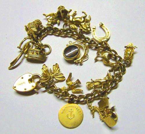 Premium Quality 2Oz-Solid GOLD Charm bracelet, 16 charms @ No Reserve!!!