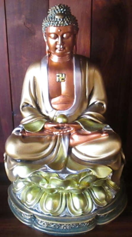 Buddha bronzed and gilded polyresin ?