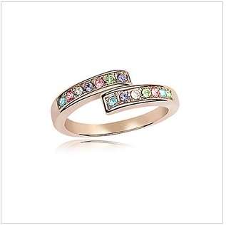Rose gold ring with coloured crystals