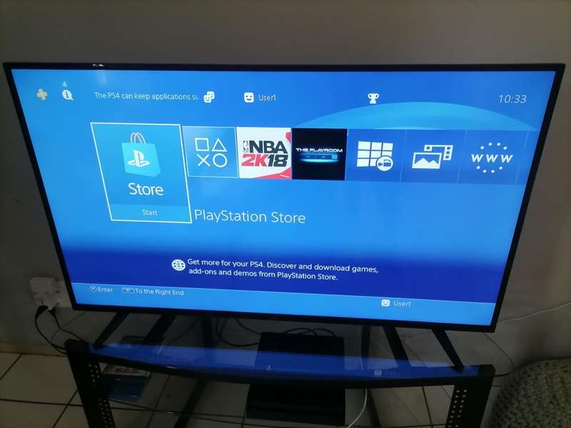 1 TB SLIM PS4 CONSOLE WITH PS4 CONTROLLER - NEAR MINT CONDITION - SAME DAY SHIPPING