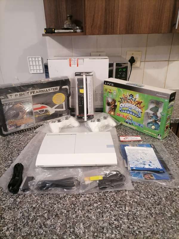 Brand New Limited Edition PS3 Console White Never been used, Huge PS3 BUNDLE!!!!