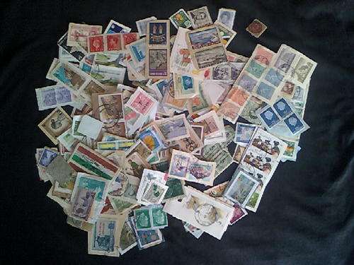 Worldwide. More than 280 used stamps on paper. Duplications.