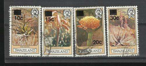 Swaziland. Group of  4 over printed Flower stamps. Used slightly hinged