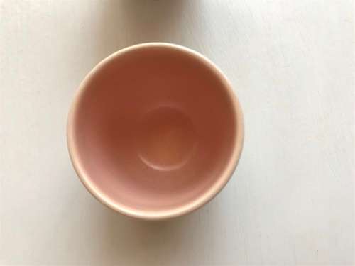 Poole pottery twin tone four-egg cup breakfast set with stand