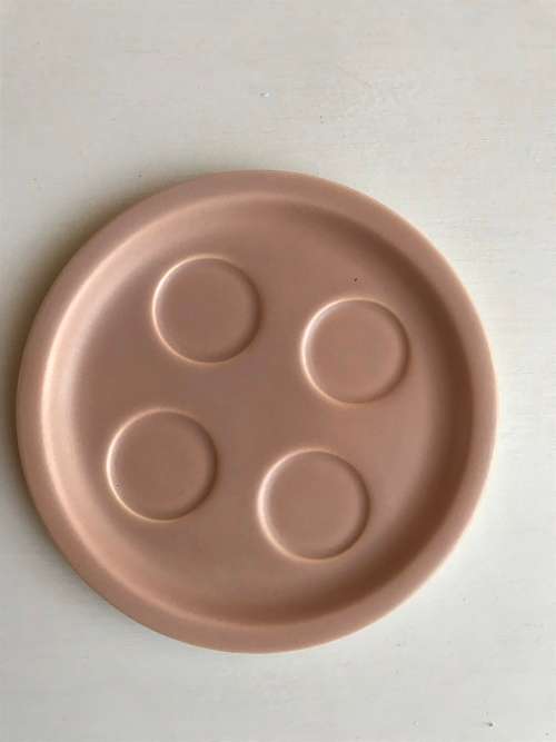 Poole pottery twin tone four-egg cup breakfast set with stand