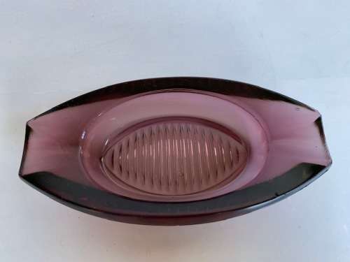 Very pretty and heavy bowl in purple glass with ridged detail
