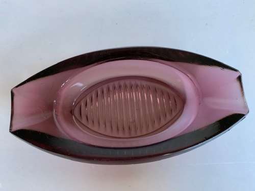 Very pretty and heavy bowl in purple glass with ridged detail