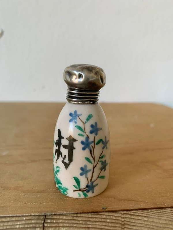 #7 Oriental perfume bottle with silver top