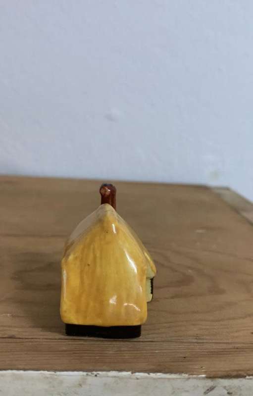 #88 Handpainted and signed ceramic thatch cottage