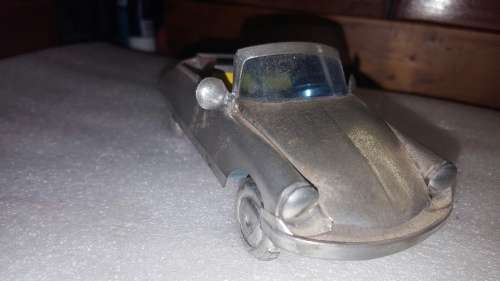 3 vintage tin toys.