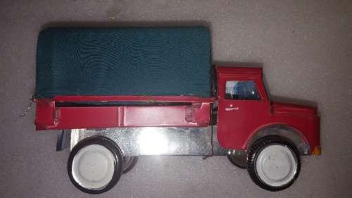 3 vintage tin toys.