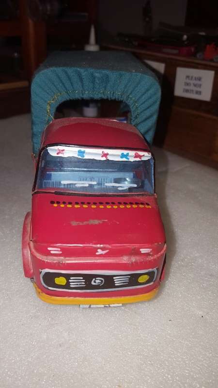 3 vintage tin toys.