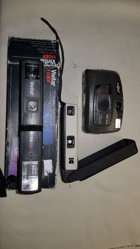 3 vintage film camera lot with two bags.