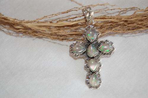 STUNNING WELO ETIOPIAN OPAL CROSS PENDANT SOLID STERLING SILVER --LOOK AT IT UNDER WATER