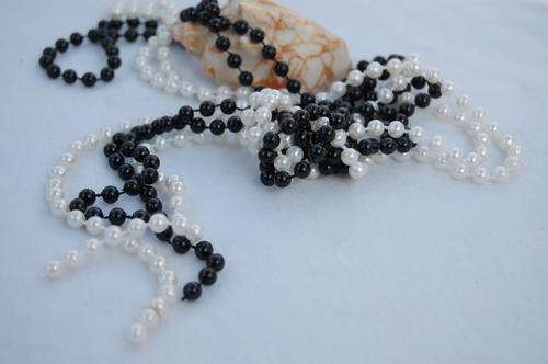 LONG STRING FAUX WHITE AND BLACK STRING OF PEARL