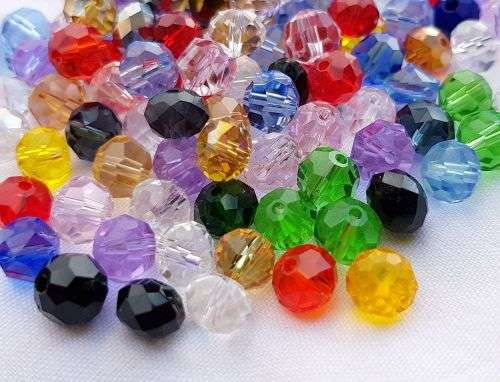 50 Assorted Glass Beads as per picture (Size between 6&8mm)