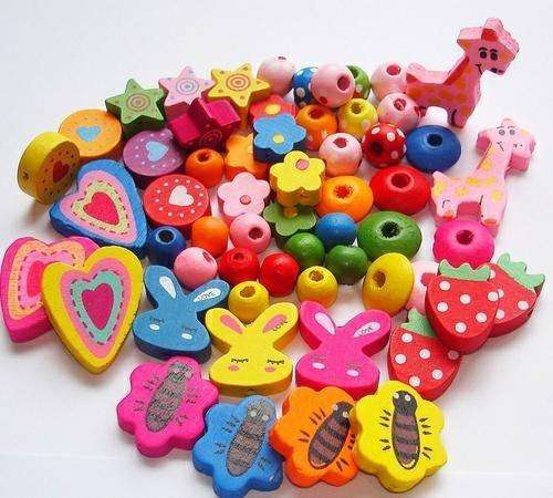 63 Assorted Wooden Beads /  Embellishments