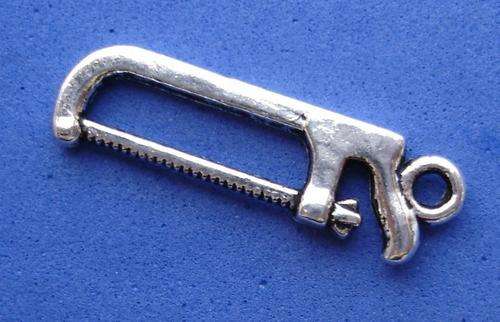 Tibetan Silver Saw Charm