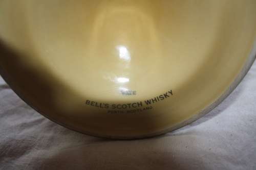 BELLS BLENDED SCOTCH WHISKEY IN WADE BELL SHAPED BOTTLE