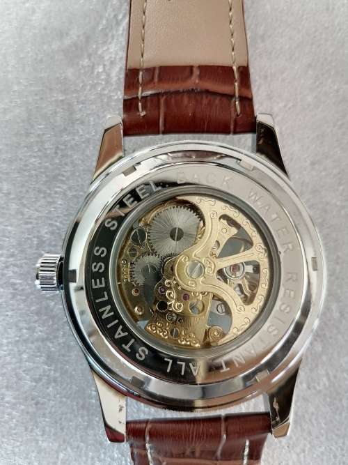Okina Navitimer skeleton silver