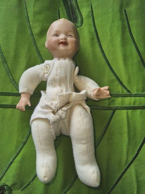BISQUE HEAD BABY DOLL GERMAN MARK ON HEAD