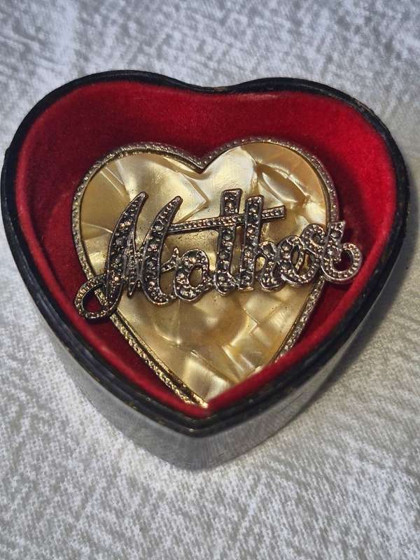 Vintage `Mother` brooch on mother of pearl in hart shape box