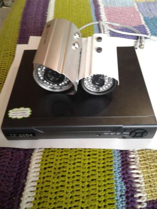 4 CHANNEL DVR INCL. 2 COLOR CAMERA ,REMOTE,MOUSE&POWER SUPPLY