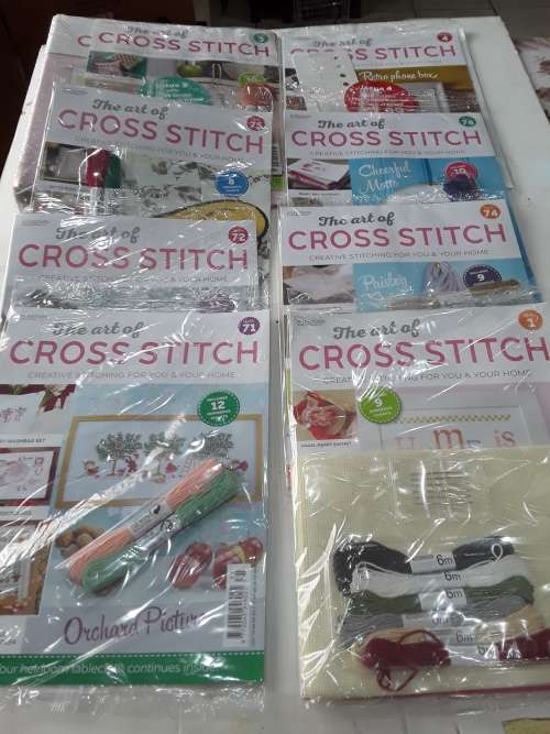 8 ISSUES OF CROSS STITCH PATTERNS(INCL.CANVAS,NEEDLES,COTTONS,BINDER, ETC...)ONE BID