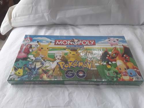POKEMON MONOPOLY GLOBAL VILLAGE BOARD GAME