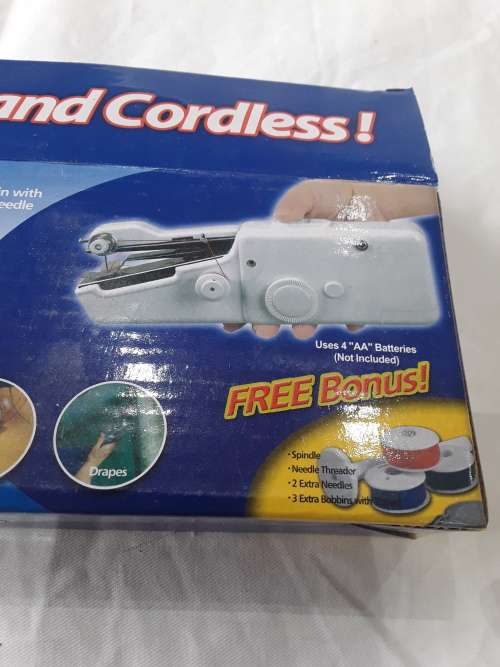 HANDHELD SEWING MACHINE WITH FREE BOBBINS