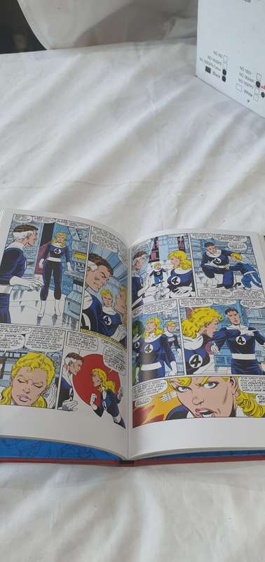 MARVEL HARDCOVER COMIC (THE INVISIBLE WOMAN)