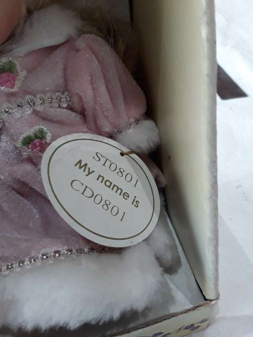 GENUINE PORCELAIN DOLL IN BOX