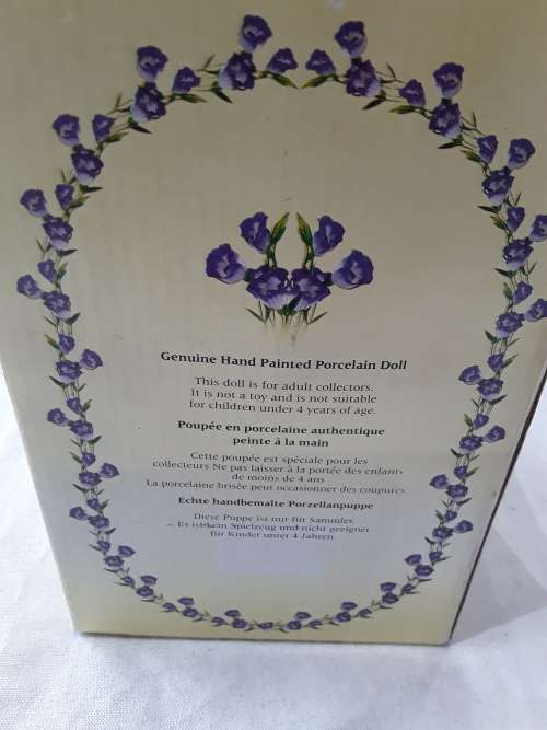 GENUINE PORCELAIN DOLL IN BOX