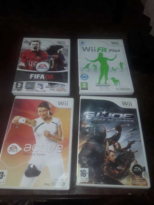 NINTENDO WII INCLUDING POWER SUPPLY, 7 GAME DISCS AND ASSESCORIES