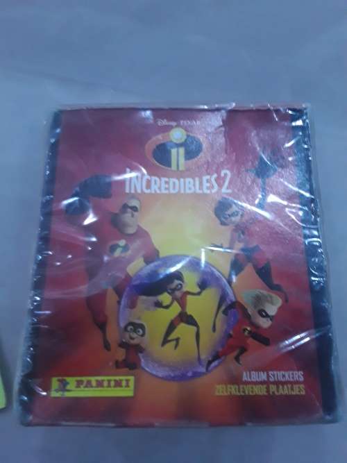BOX OF 36 PACKETS INCREDIBLES 2 STICKERS(5-6 STICKERS IN A PACK) AND A STICKER ALBUM