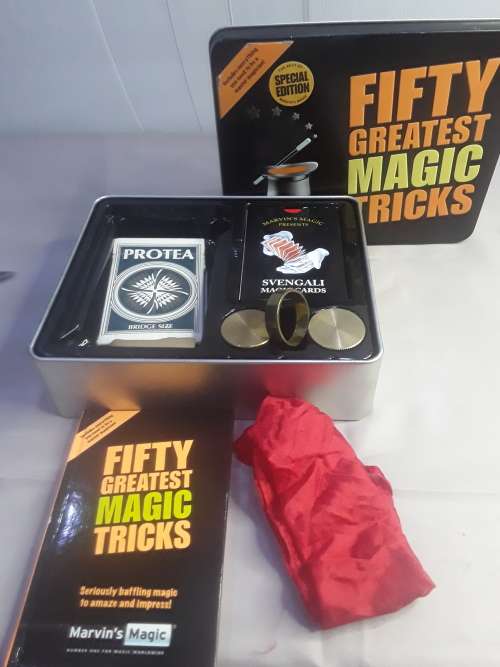 SPECIAL EDITION 50 GREATEST MAGIC TRICKS (BRASS KNOBS AND RINGS,ETC..)MINT CONDITION