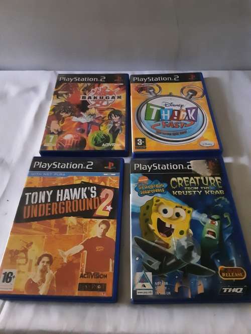 PS2 CONSOLE INCL.POWER SUPPLY, 2 REMOTES AND 13 GAME DISCS