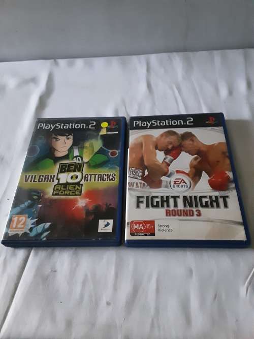 PS2 CONSOLE INCL.POWER SUPPLY, 2 REMOTES AND 13 GAME DISCS