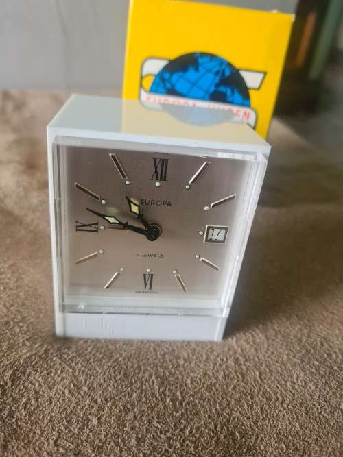 VINTAGE MECHANICAL 2 JEWELS EUROPA ALARM CLOCK WITH DATE IN ORIGINAL BOX