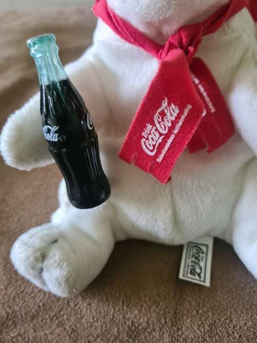 VINTAGE COCA COLA PLUSH TOY HOLDING COKE BOTTLE(15CM HEIGHT SEATED)