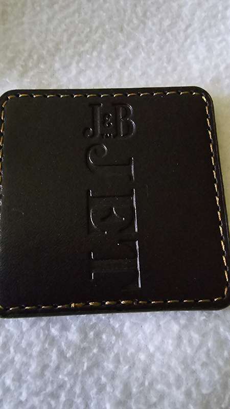 SET OF 4 J&B JET LEATHER COASTERS IN ORIGINAL LEATHER CASE