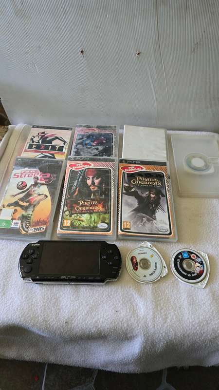 SONY PSP CONSOLE INCL.9 GAME DISC-SEE DESCRIPTION