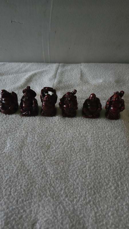SET OF SIX MINIATURE RED CHINES BUDDAHS(RESIN)