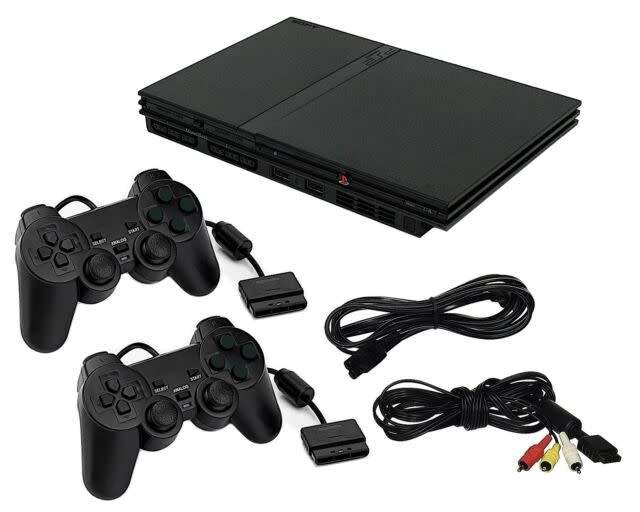 PS2 Console + 2 Original Controllers + 2 Games + 8MB Memmory Card ** EXCELLENT CONDITION