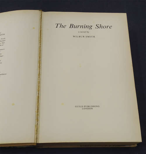 Pair of Book Club Edition Wilbur Smith Books with Dust Jackets - The Burning Shore and Rage
