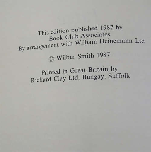 Pair of Book Club Edition Wilbur Smith Books with Dust Jackets - The Burning Shore and Rage